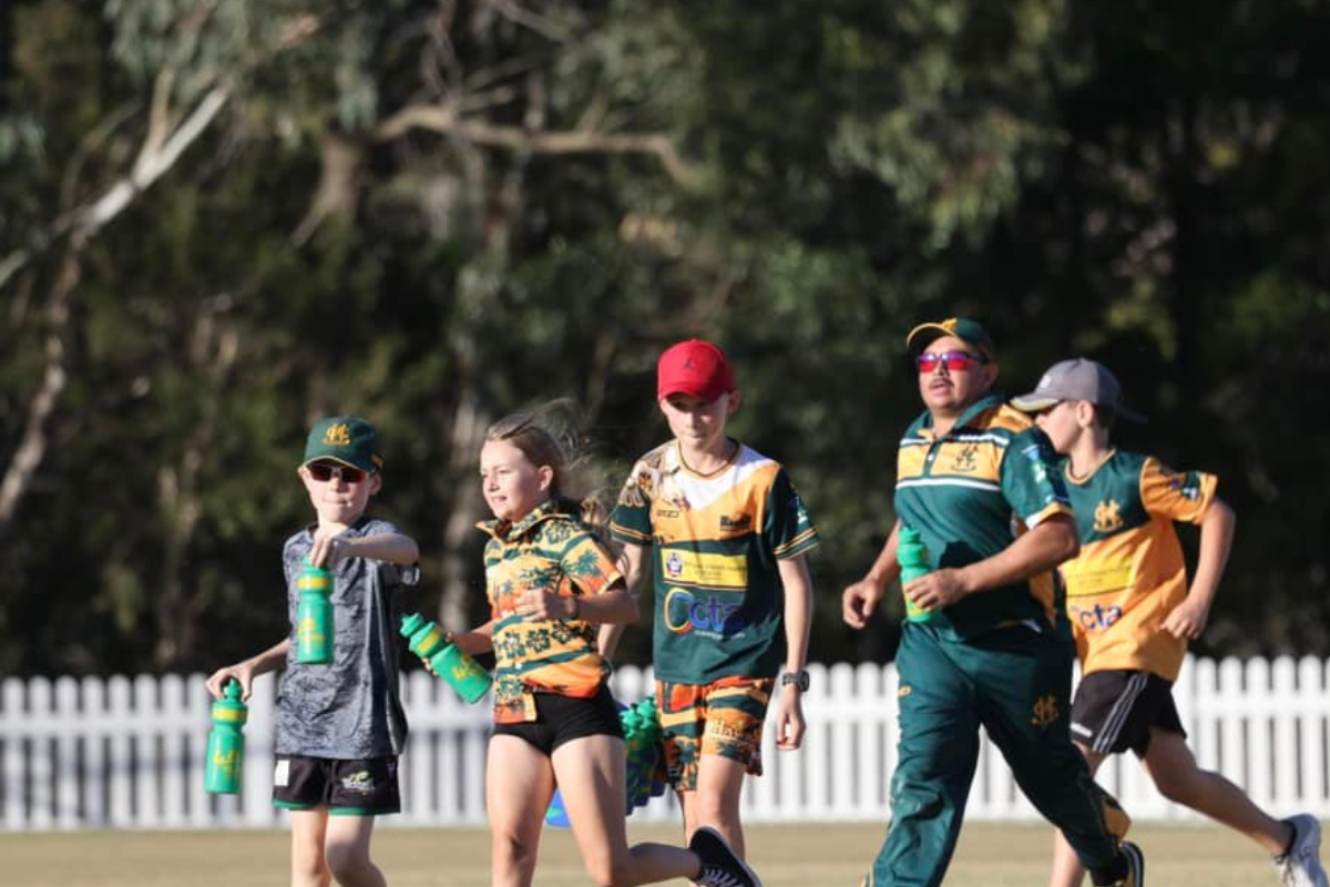 Helensvale Hawks Cricket Club Juniors running on the field
